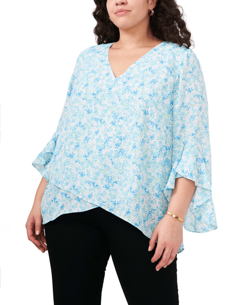 Front of a model wearing a size 1X Isla Ruffle Sleeve Tunic in COOL WATERS by Vince Camuto. | dia_product_style_image_id:261146